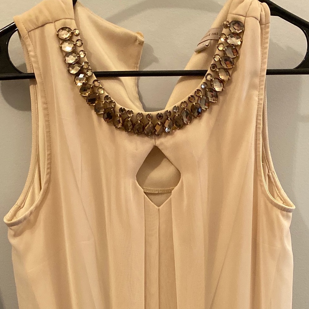Cream colored dress with jeweled neckline